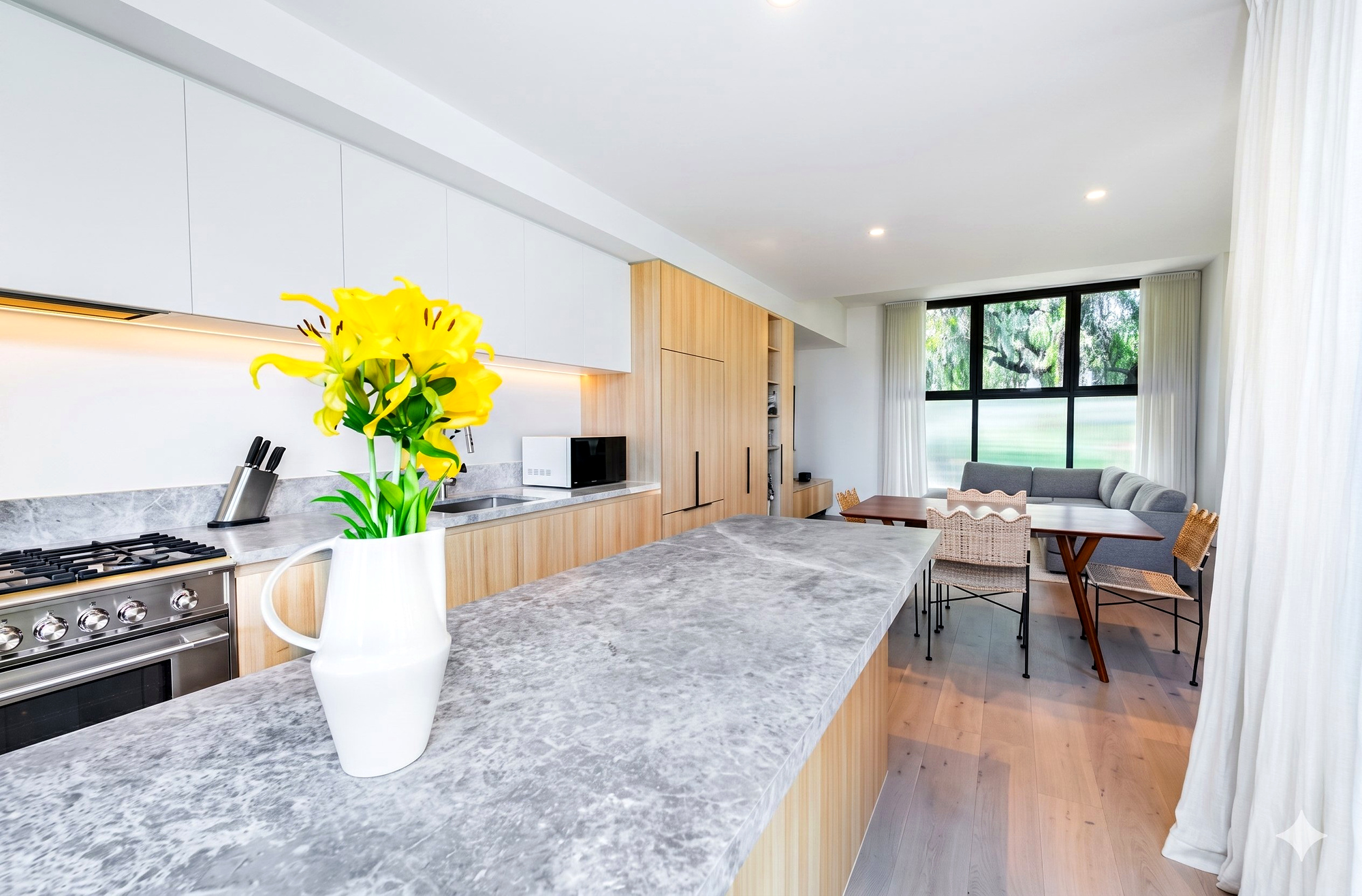 Kitchen galley with marble benchtops